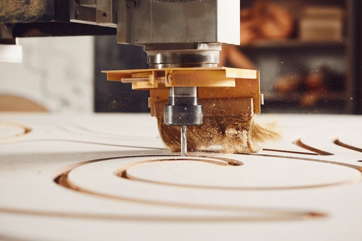 Close-up shot of machine with numerical control cuts wood. Cnc tool.